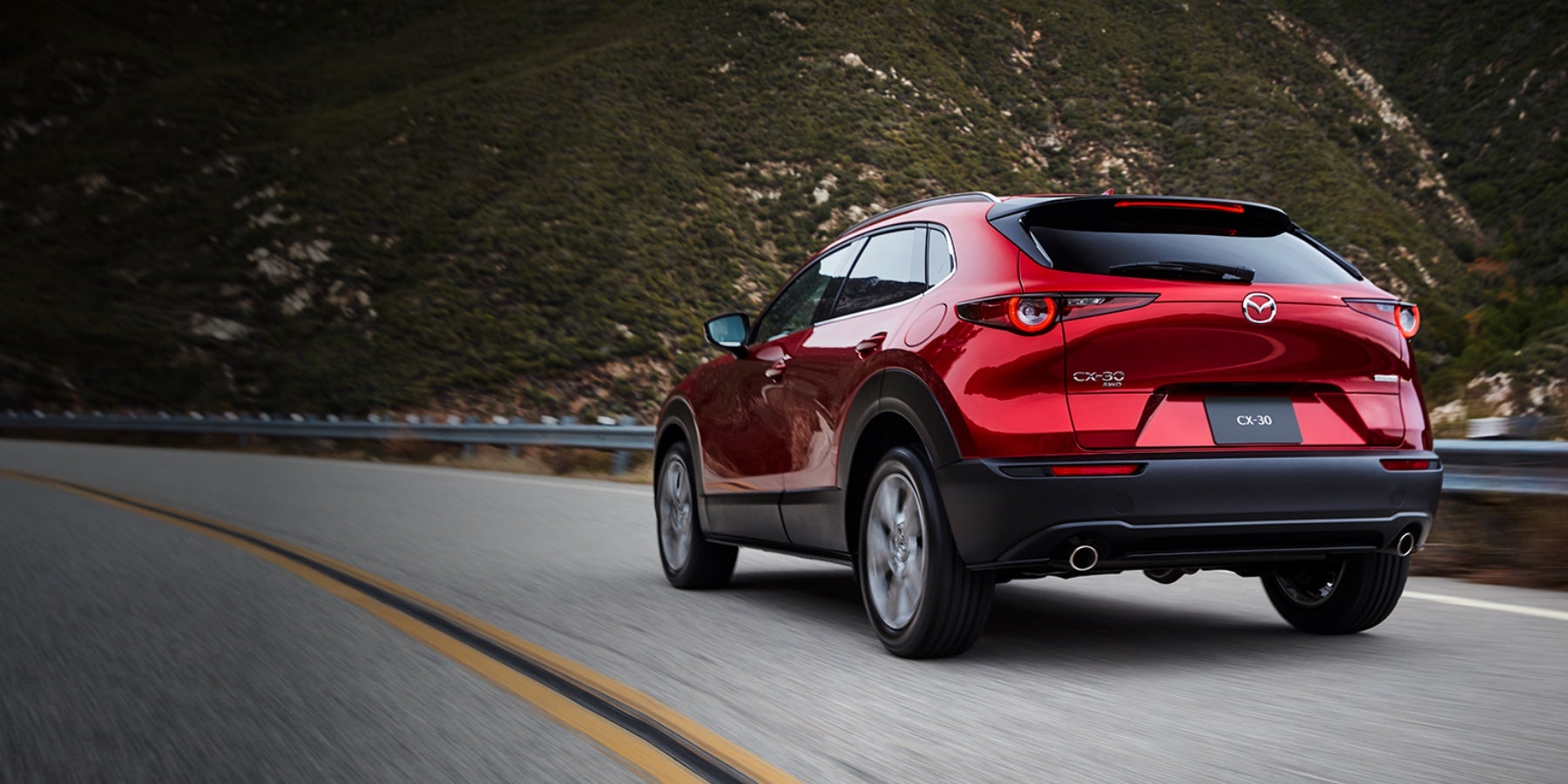 Red 2020 Mazda CX-30 Driving on the road | Koch 33 Mazda in Easton, PA